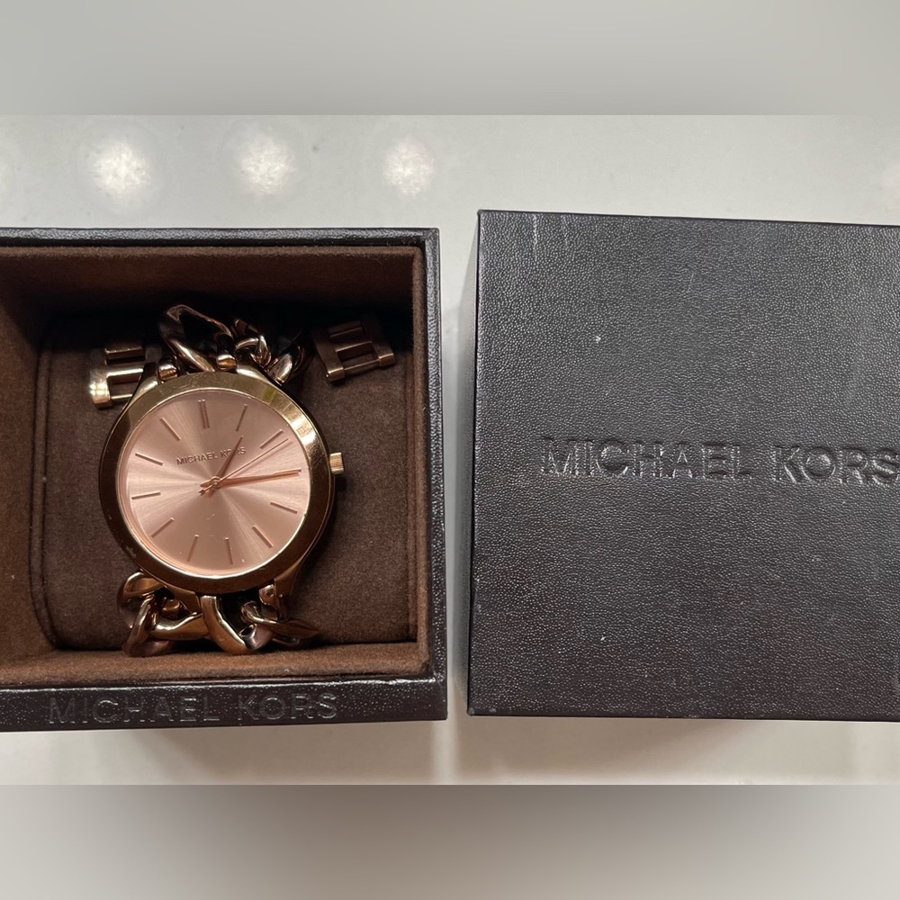 Micheal Kors Rose Gold slim Runway watch